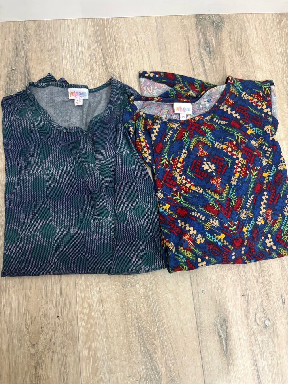 LuLaRoe Women’s Irma Tops in Navy, Green & Multicolor Patterned Prints